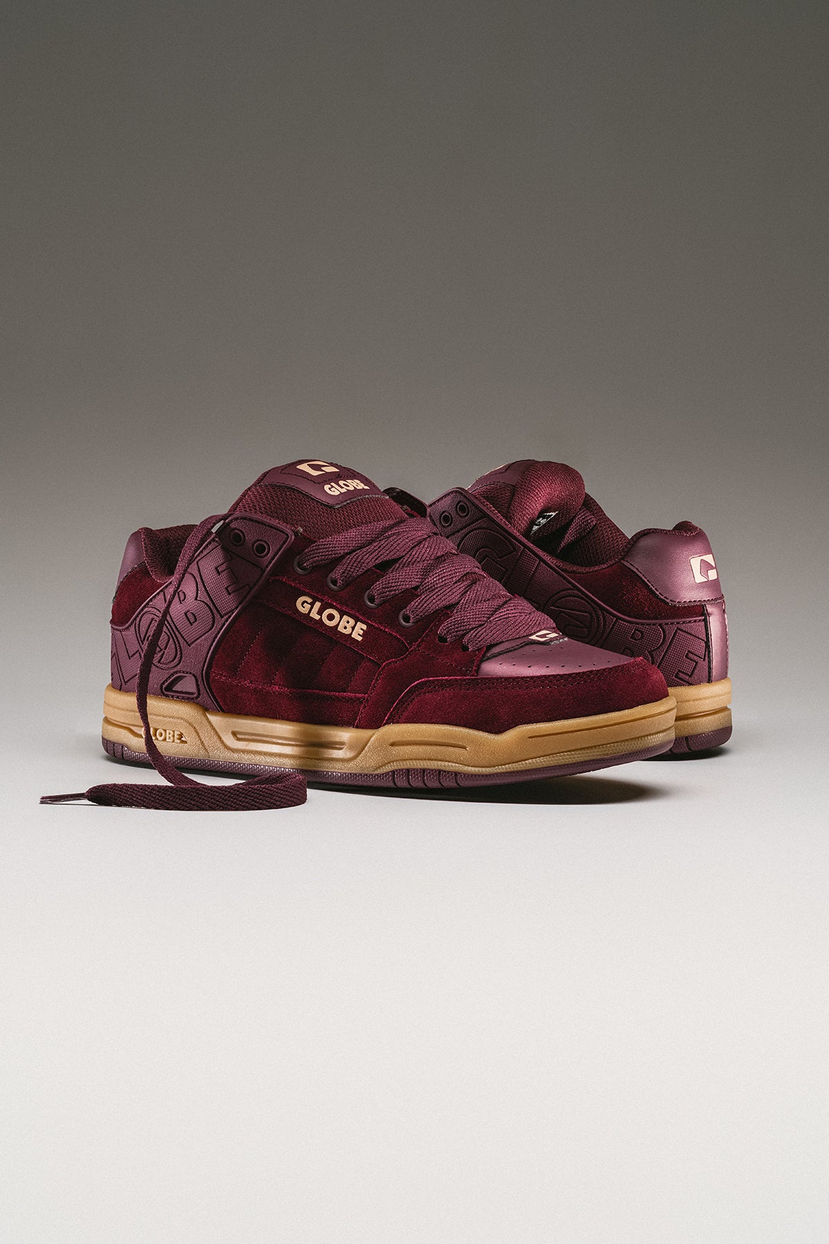 Port Gum Globe Tilt sneakers in burgundy with white laces and a tan gum sole