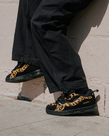 Lifestyle image of the Heritage Animal Pack shoes. 