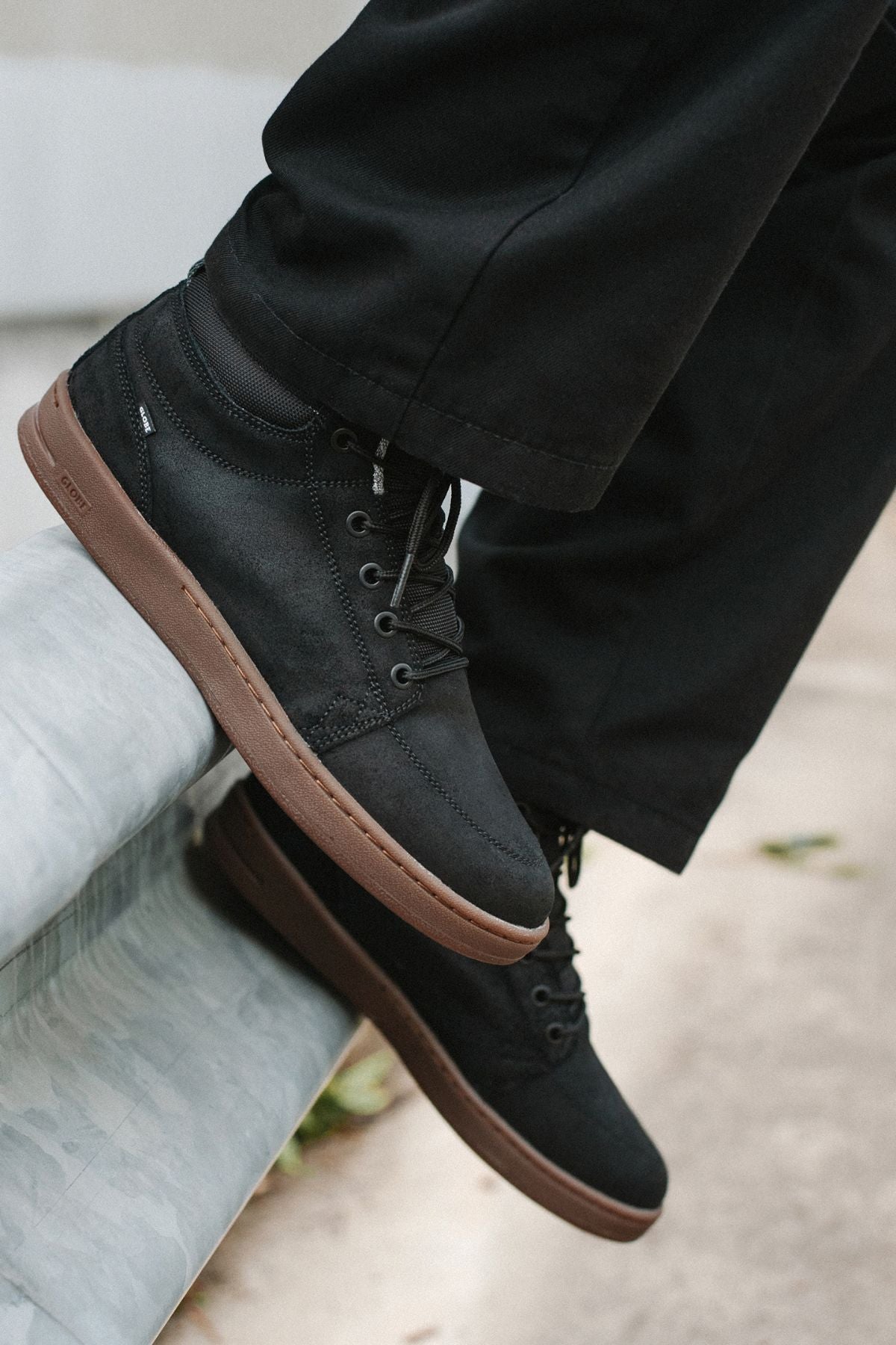 Close-up of GS Boot in Black Oiled/Gum with black suede nylon upper, laces and brown gum cup sole.