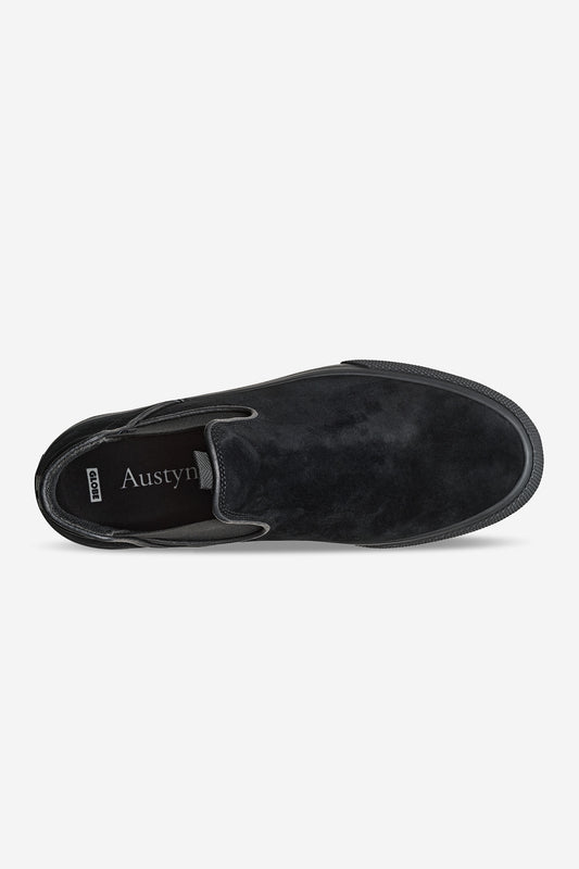 Top view of the Dover - Black Suede/Gillette skate shoe featuring black suede, a rounded toe, elastic side panels, visible stitching, a comfortable Austyn insole, and a durable black rubber sole.