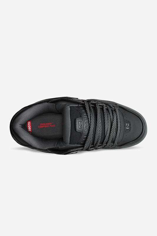 Top view of the Sabre - Dark Shadow/Phantom skate shoe with black laces, padded tongue, and interior. The DC logo appears on the tongue and insole, with IMPACT-ALG TECHNOLOGY text in red on the insole.