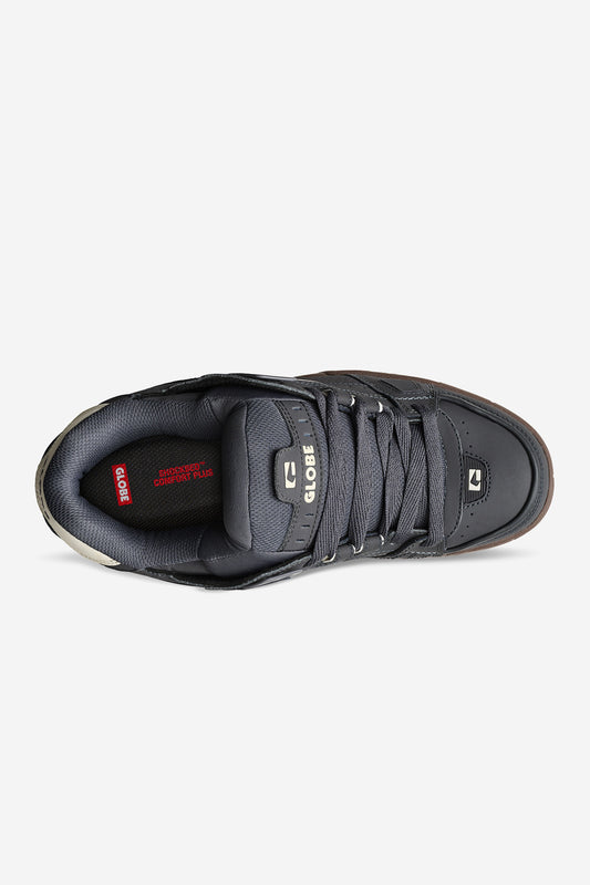 Top view of the Sabre - Lead/Gum skate shoe with grey laces, padded tongue with a Globe logo, and a red insole displaying the Globe brand and SHOCKBED™ in white text for comfort and stability.