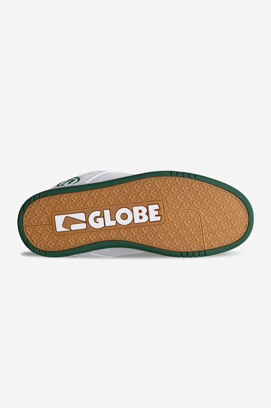 The image shows the sole of the Tilt - White/Green shoe, featuring a brown gum S-Trac tread with green trim. The word "GLOBE" and its logo are displayed in white on the bottom.