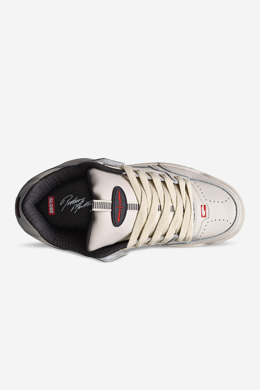 Top view of the Tilt Prime - Cement / Mullen skate shoe, designed for street skating with cream laces, black lining, red accents, and signature insole text. Modern sporty style inspired by Rodney Mullen.