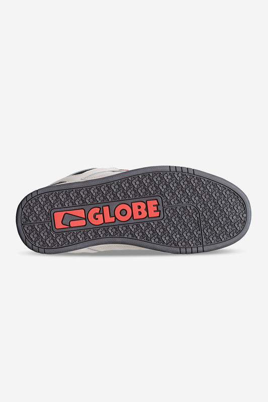 The image shows the sole of the Tilt Prime - Cement / Mullen skate shoe with a textured black rubber pattern and a red "GLOBE" logo, a design often seen on street skating icons like Rodney Mullen.