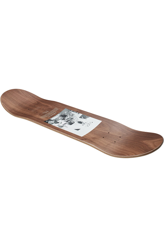 The Eames Silhouette Deck Deck 8.25" - Hang-It-All features a natural walnut veneer, a bold black and white graphic in the center, upturned nose and tail, all paying tribute to Charles and Ray Eames' design legacy.
