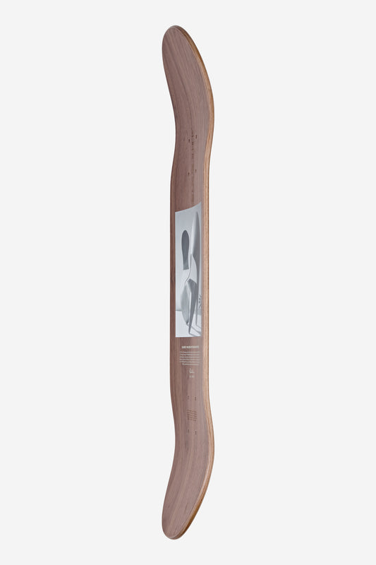 The Eames Silhouette Deck 8.0" – Plywood Sculpture features a unique shape with curved, upturned ends and a grayscale abstract design at the center, inspired by plywood sculpture, showcased against a plain white background.