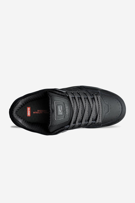 Top view of the Tilt - Dark Shadow/Phantom skate shoe with gray laces, padded tongue, visible red insole tag, stitched details, smooth matte finish, and a durable Strobo cup sole for classic style and support.